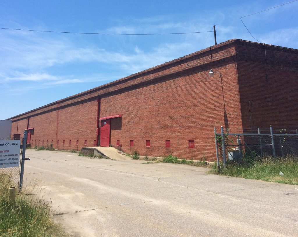 Developers won approval in September to convert the former tobacco warehouse at 1650 Overbrook Road into as many as 117 apartments. (Kieran McQuilkin)