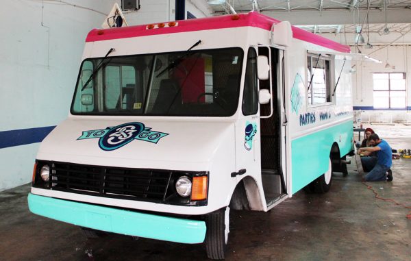 The nonprofit refurbished a 1999 GMC Savana to offer mobile printing services. (Mike Platania)