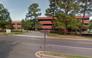 A pair of vacant office buildings at 4240 and 4300 Cox Road were sold for $6 million. (Google Maps)