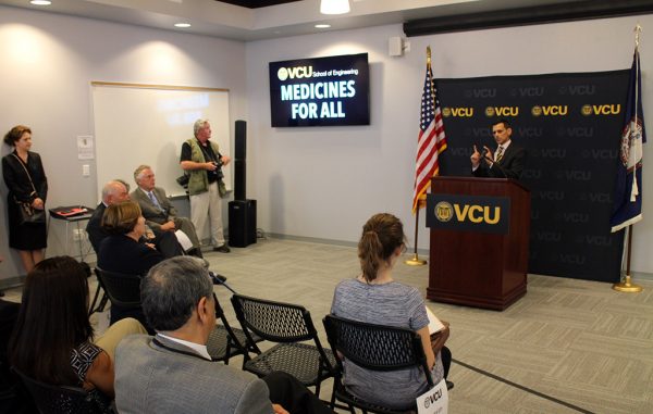 VCU President Michael Rao addresses attendees at Thursday's announcement in the Biotech Eight building. (Jonathan Spiers)