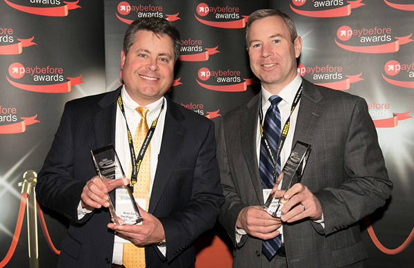 Brian Cook, senior vice president for sales and marketing at The Payments Company, and John Barbella of the Bancorp Bank at the 2013 Paybefore Awards.