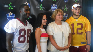Redskins wide receiver Pierre Garçon, left, HDL chief medical officer Tara Dall, HDL chief executive Tonya Mallory and Redskins quarterback Kirk Cousins. (Photo by Burl Rolett)