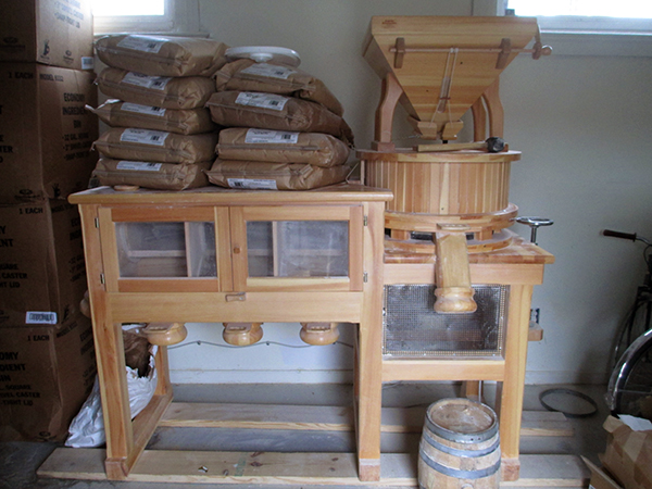 A SEED grant helped pay for a stone mill imported from Austria.