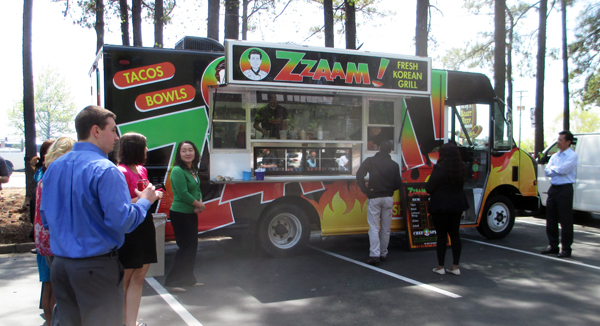 Derek Cha, founder of Sweet Frog, unveils his newest business -- Korean barbecue food truck Zzaam! (Photo by Michael Thompson) 
