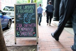A sign outside Urban Farmhouse's Cary Street outpost in July 2015. (BizSense file photo)