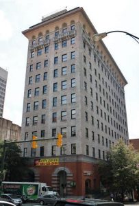 The 12-story American Heritage building has been handed off to a new owner. Photo by Burl Rolett.