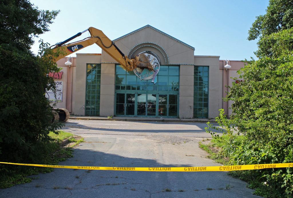 Demolition crews ceremoniously tear down the Fairfield Commons mall on Thursday. Photos by Katie Demeria.
