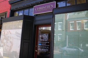 Long & Foster sports the Christie's brand at its Strawberry Street office. Photo by Jonathan Spiers.