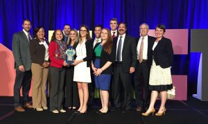 DHG accepts its Young Professional Workplace Award.
