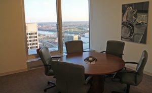 Large windows throughout the office show off top-floor views. 