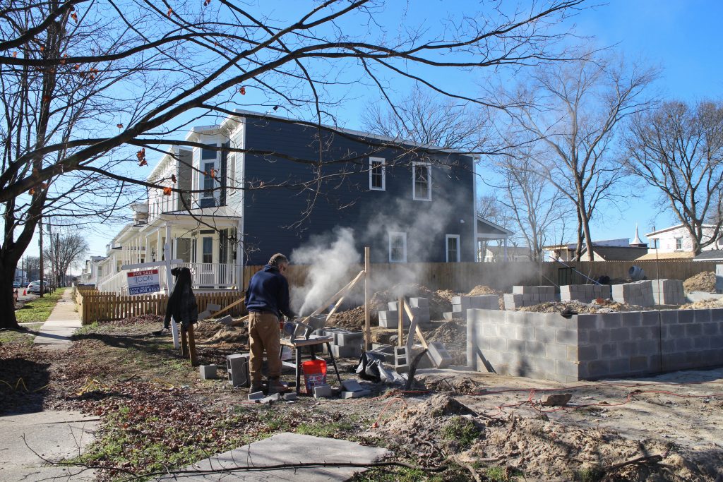 Crews work on the foundation of a new home on North 26th Street between S and T streets in Church Hill. Photos by Jonathan Spiers.