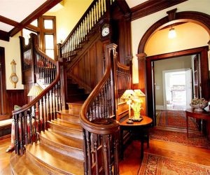 The home's grand hall features a prominent staircase.