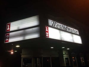 The theater's signs went bare Sunday evening. 