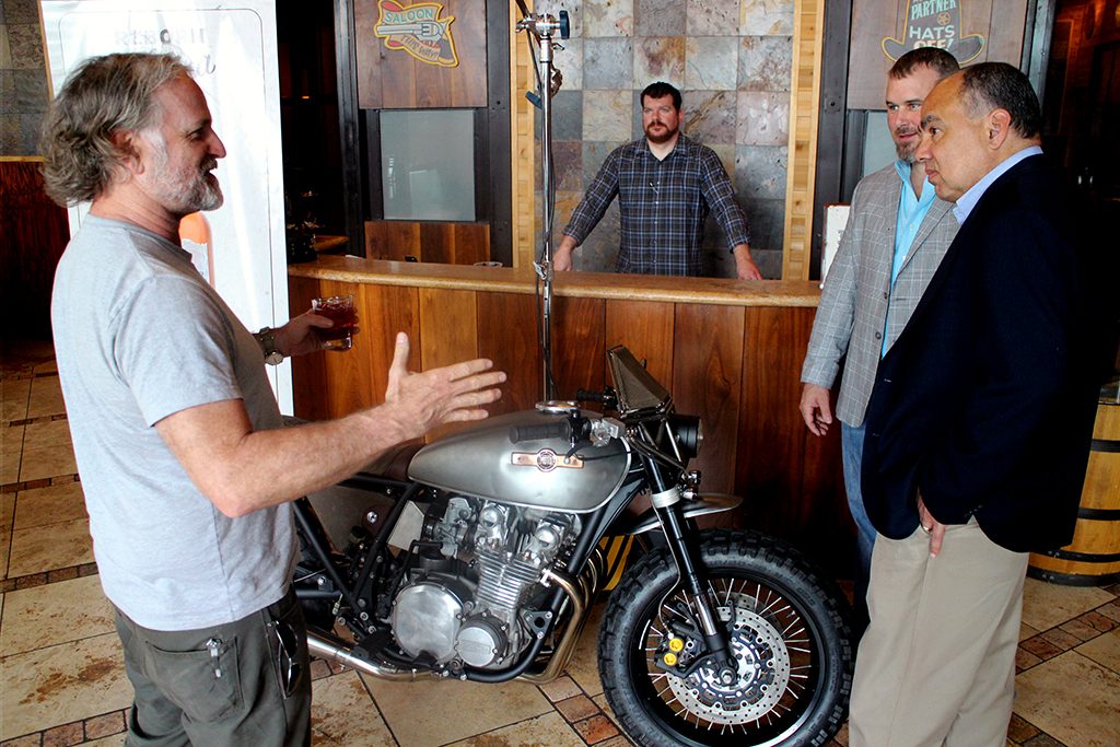 Chris Ryland shows off the bike at Monday's event. Photos by Jonathan Spiers. 