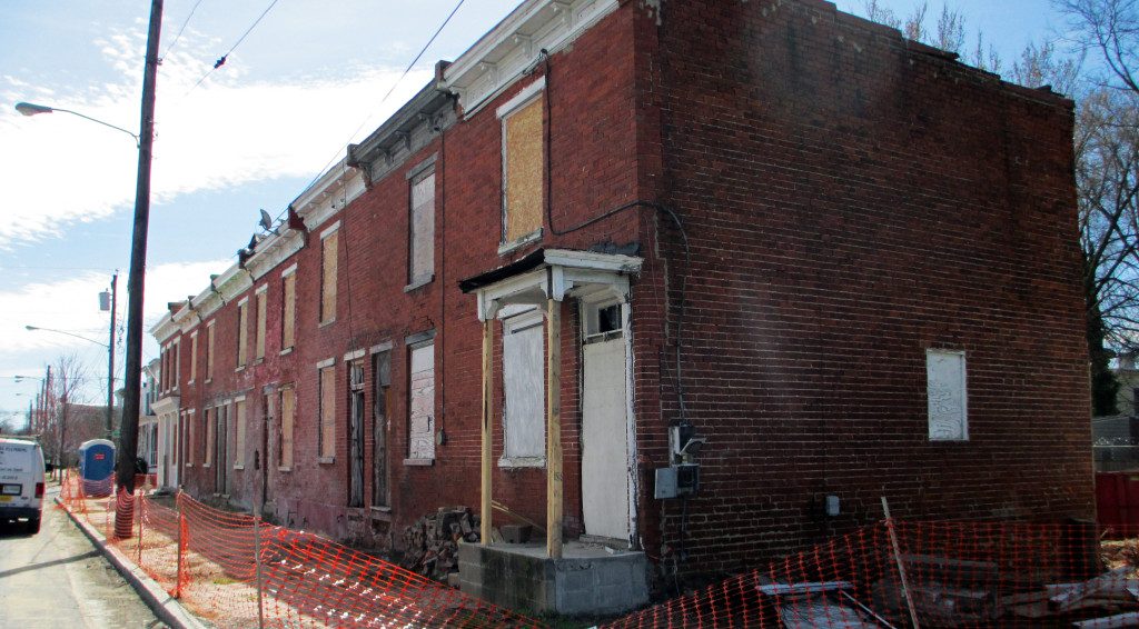 The developer scraped brightly colored paint off the brick structure in early 2015. (Jonathan Spiers)