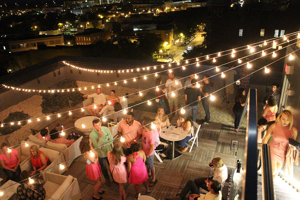 Attendees were encouraged to dress in pink and drink rosé on Quirk's popular Rooftop Bar and Terrace. (Jonathan Spiers)