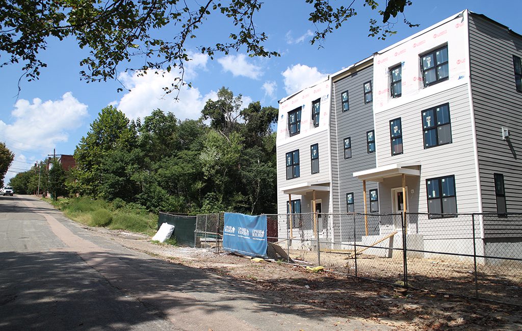 The first of several new homes planned for the Sugar Bottom area are going vertical at the end of East Franklin Street, downhill from Libby Hill Park. (Jonathan Spiers)
