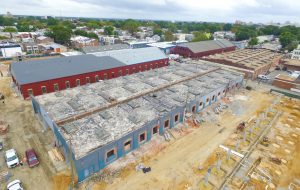 The two new buildings will be complete in spring 2017, after the seven existing rehabbed buildings are opened in stages in March. (Kieran McQuilkin)