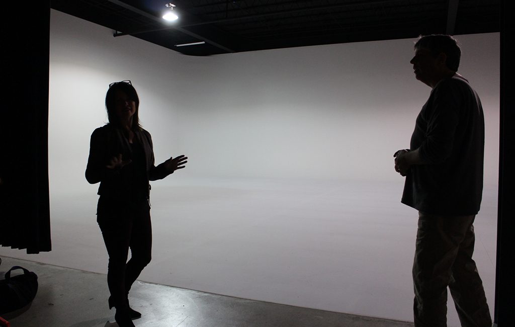 Stacy Murphy and Dave Trownsell in front of the 40-by-60-foot shooting space, a literal blank canvas. (Jonathan Spiers)