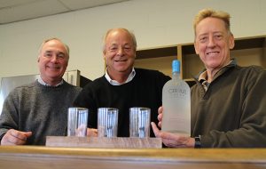 From left: Gary McDowell, Sterling Roberts and Paul McCann in the Cirrus Vodka tasting room. (J. Elias O'Neal)