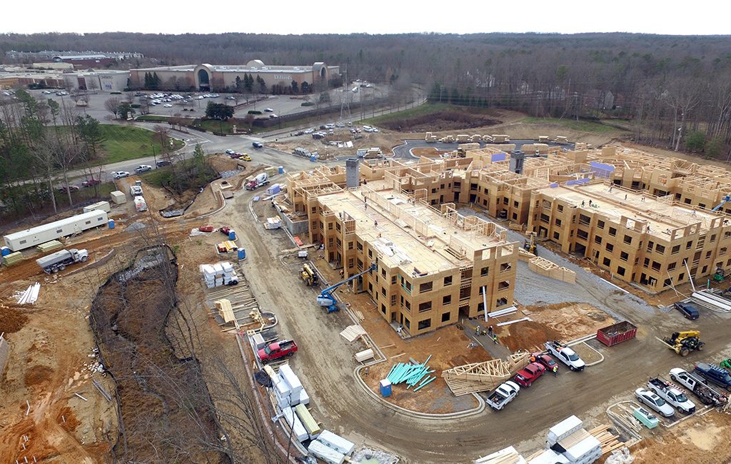 Apartments being built at the 27-acre site just north of Dillard's at the mall's northern end. (Kieran McQuilkin)