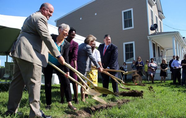 Officials break ground on the 26th Street site, where construction was slated to begin Thursday. (Jonathan Spiers)