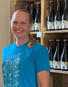 Blue Bee Cider owner Courtney Mailey right