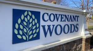covenant woods sign