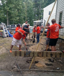 Home Depot employees volunteered with Habitat for Humanity to build homes for veterans.
