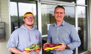 Natural running store employee Austin Archer, left, and founder Patton Gleason